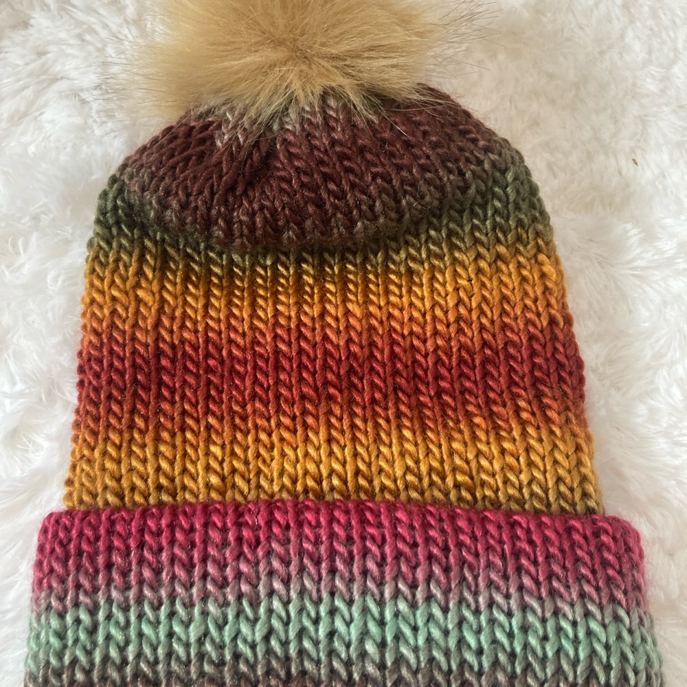 Vibrant shades of orange,red,green hat.Reversible removable pompom.unisex soft